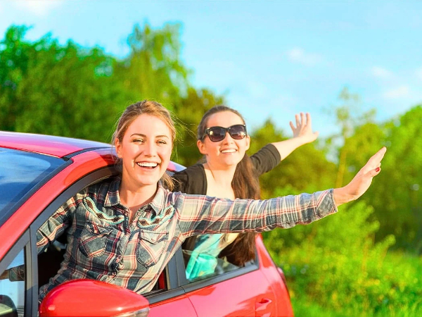 Woman Driving in Nature