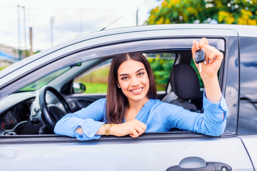 Woman with a Rental Car